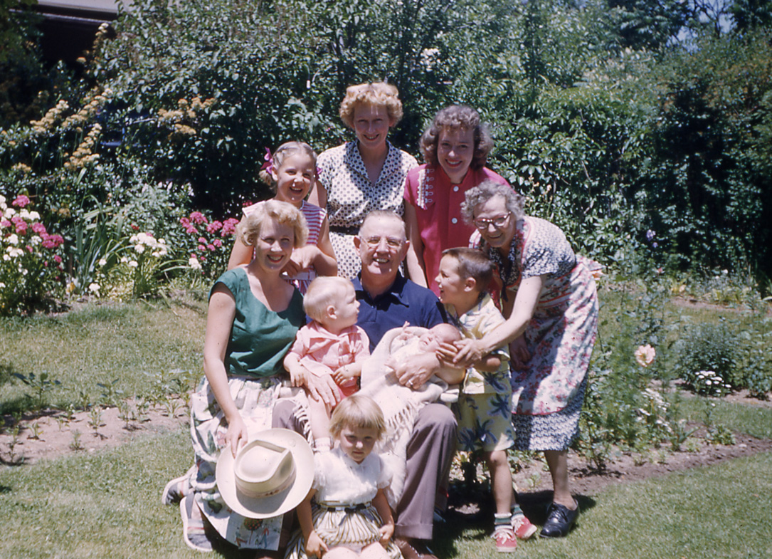 Family in garden at home on Diestel Road.