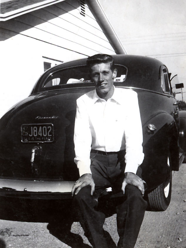 Marty Sitting on a car in 1947